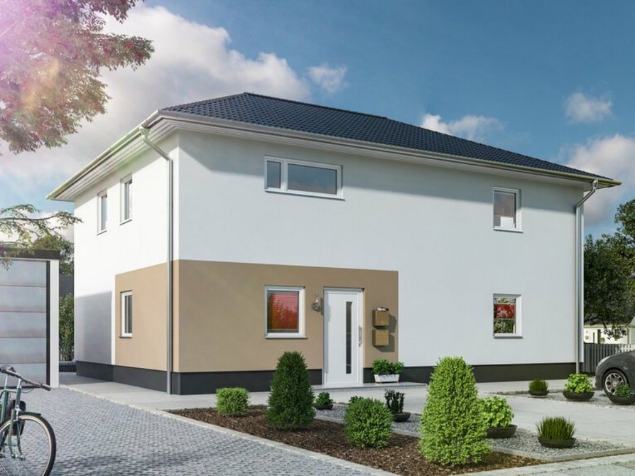 Das Zweifamilienhaus Flair 180 Duo mit Blick von der Straße, optionalem farblichen Akzenzt, Carport und modernem Walmdach in Anthrazit